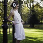 20s style silky wedding dress with crochet accessories by Iwona Luka